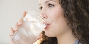 landscape-1430247360-woman-drinking-water