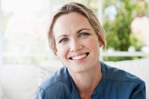 Portrait of smiling middle-age woman --- Image by © Olix Wirtinger/Corbis