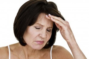 Mature woman with headache