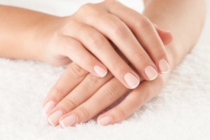 Beautiful hands on the white towel