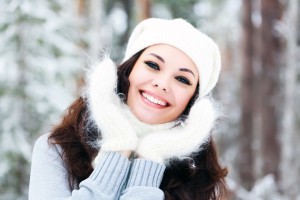 Cheerful girl posing outdoors