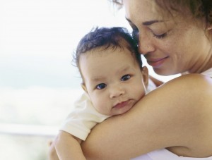 Close-up of a mother holding her baby boy